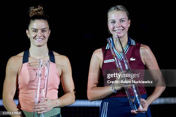 Winner Anett Kontaveit from Estonia poses with the winners trophy and Maria Sakkari from Greece holds the runner up trophy during the awards ceremony...