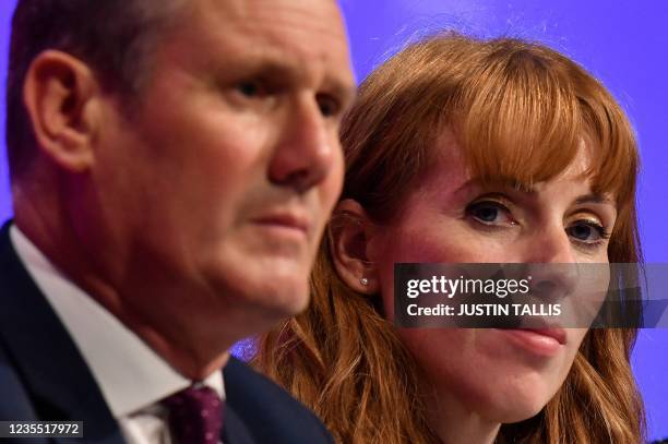 Britain's main opposition Labour Party leader Keir Starmer and Britain's main opposition Labour Party deputy leader Angela Rayner sit in the...