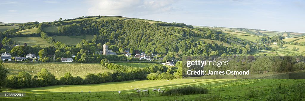 Panoramic view of Winsford village nestled in countryside in Exmoor National Park in Somerset.