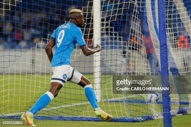 Napoli's Nigerian forward Victor Osimhen celebrates after opening the scoring during the Italian Serie A between Napoli and Cagliari on September 26,...