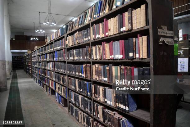 Books are seen on shelves in the central library of Dhaka University after reopen in Dhaka, Bangladesh, on September 26 as Dhaka Universitys central...