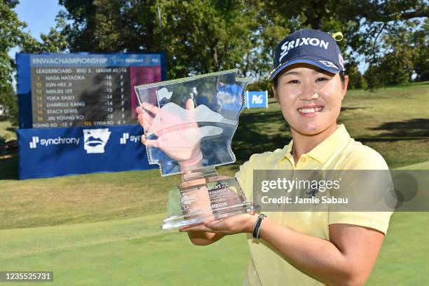 Nasa Hataoka of Japan poses with the trophy after winning the Walmart NW Arkansas Championship at Pinnacle Country Club on September 26, 2021 in...