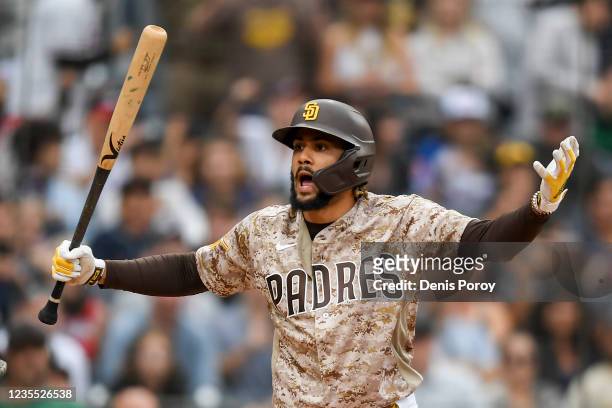 Fernando Tatis Jr. #23 of the San Diego Padres reacts to a called third strike in the ninth inning against the Atlanta Braves at Petco Park on...