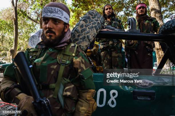 Taliban fighters get ready to head out on patrol from PD10, in Kabul, Afghanistan, Thursday, Sept. 2, 2021.