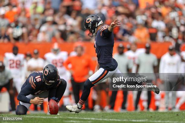Chicago Bears place kicker Cairo Santos kicks a 29-yard field goal out of the hold of Chicago Bears punter Pat O'Donnell during the third quarter of...
