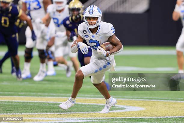 Antoine Green of the North Carolina Tar Heels looks ahead to the open field during the Saturday evening college football game between the Georgia...