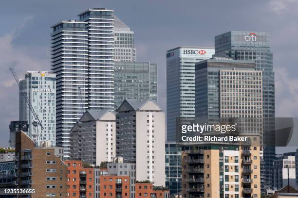 Thames riverside residential and office properties at Canary Wharf in London Docklands, on 16th September 2021, in London, England. Canary Wharf was...