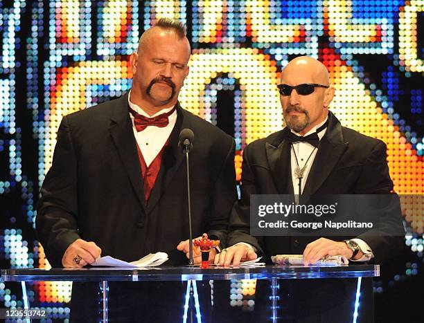 Road Warrior Animal and manager Paul Ellering attend the WWE 2011 Hall Of Fame Induction at Philips Arena on April 2, 2011 in Atlanta, Georgia.