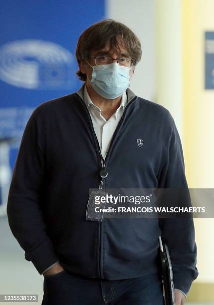 Exiled former Catalan president Carles Puigdemont arrives to attend the European Parliament's Committee on International Trade in Brussels on...