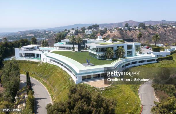 Beverly Hills, CA An aerial view of "The One Bel Air", a 105,000-square-foot mansion with a sky deck and putting green, night club, several swimming...