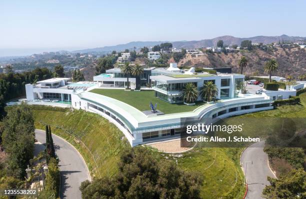 Beverly Hills, CA An aerial view of "The One Bel Air", a 105,000-square-foot mansion with a sky deck and putting green, night club, several swimming...