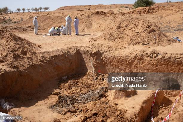 Members of the General Authority for Search and Identification of Missing Persons team discover five bodies who are the victims of Al-Kaneyat...