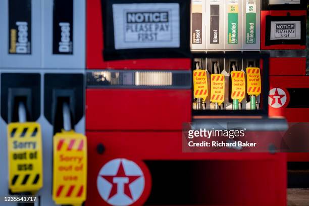 As the fuel transport crisis continues into its second week, sealed Texaco petrol and diesel pumps are covered in a closed petrol and fuel station in...
