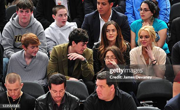 Cody Lohan, Michael Lohan Jr., Ali Lohan and Lindsay Lohan attend the Memphis Grizzlies vs New York Knicks game at Madison Square Garden on March 17,...