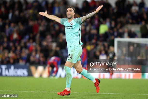 Shane Duffy of Brighton antagonises the Palace fans with his celebration of their last minute equaliser during the Premier League match between...