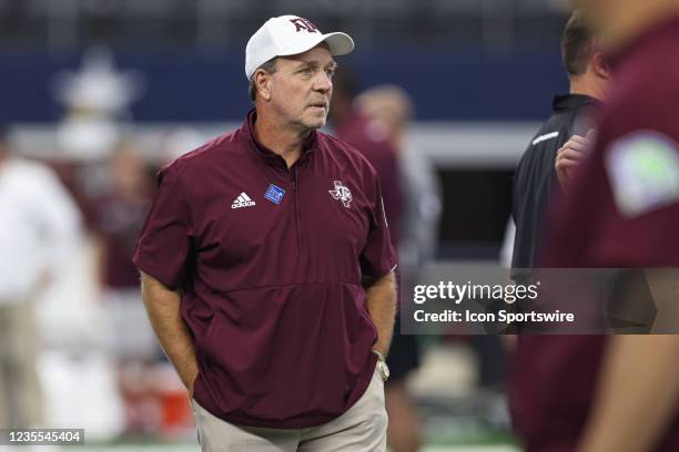 Texas A&M coach Jimbo Fisher watches his team warm up before the Southwest Classic between the Arkansas Razorbacks and the Texas A&M Aggies on...