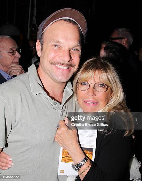 Norbet Leo Butz and Nancy Sinatra pose backstage at the hit musical "Catch Me If You Can" on Broadway at The Neil Simon Theater on June 3, 2011 in...