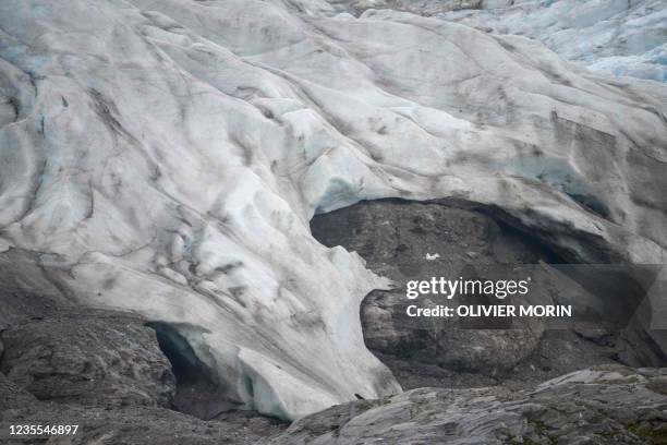 View of Nordenskiold glacier melting and collapsing in the ocean, near Pyramiden, in Svalbard, a northern Norwegian archipelago on September 22, 2021.