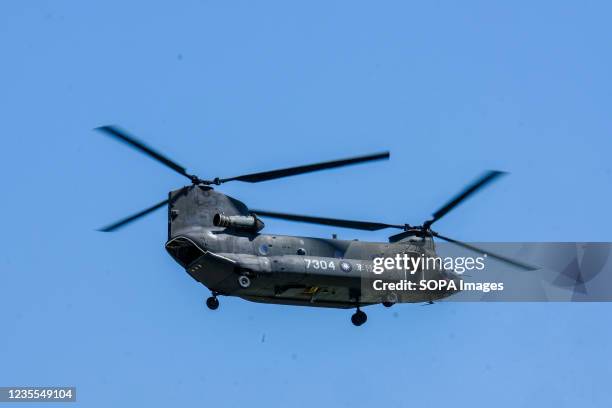 Helicopter flies during the rehearsal for the National Day celebrations at a military airbase in Taoyuan.