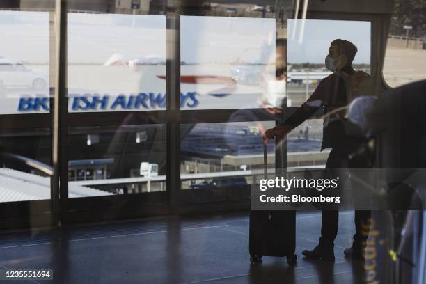 British Airways signage outside Terminal 7 at John F. Kennedy International Airport in New York, U.S., on Monday, Sept 27, 2021. The U.S. Will soon...