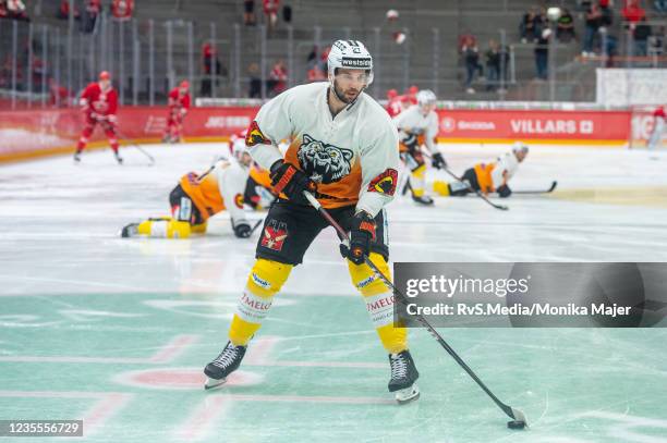 Simon Moser of SC Bern warms up prior the Swiss National League game between Lausanne HC and SC Bern at Vaudoise Arena on September 28, 2021 in...