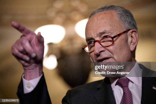 Senate Majority Leader Chuck Schumer speaks to reporters after a lunch meeting with Senate Democrats at the U.S. Capitol on September 28, 2021 in...