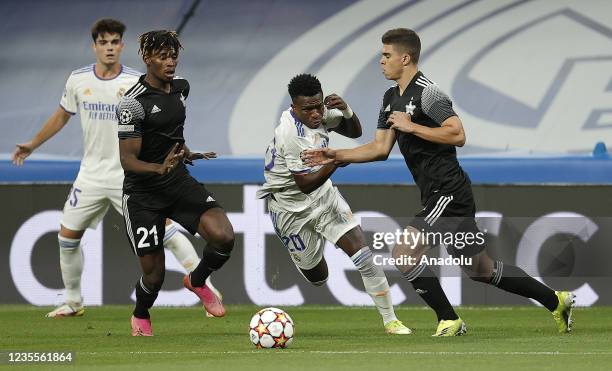 Vinicius Junior of Real Madrid in action against Fernando Costanza of Sheriff during the UEFA Champions League Group D match between Real Madrid and...