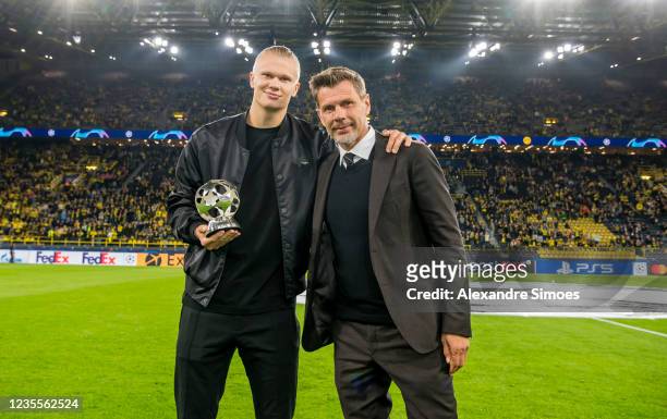 Zvonimir Boban, UEFA Chief of Football and Erling Haaland of Borussia Dortmund with his Forward of the Season Award prior the Champions League Group...