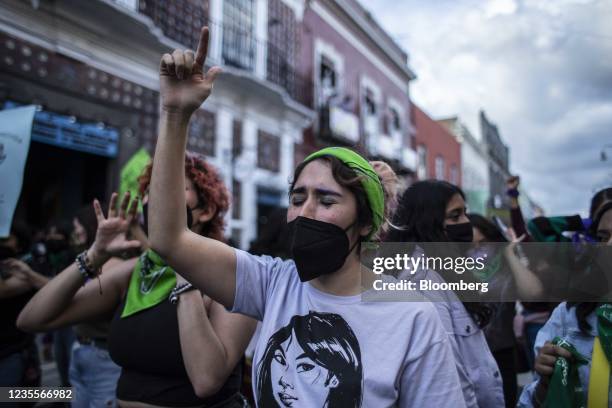 Demonstrator raises a fist during a rally for the decriminalization of abortions in Puebla, Mexico, on Tuesday, Sept. 28, 2021. Mexicos Supreme Court...