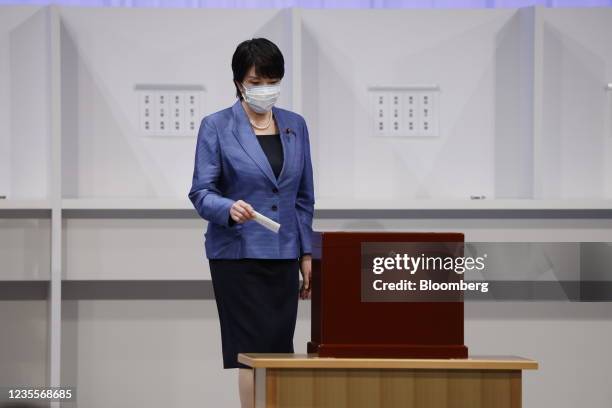 Sanae Takaichi, former minister of internal affairs and communications of Japan, casts her ballot at the Liberal Democratic Party's leadership...