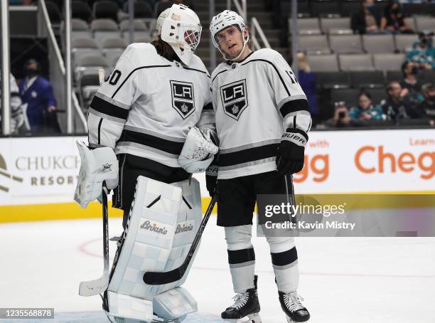 Garret Sparks and Lias Andersson of the Los Angeles Kings celebrate the preseason win against the San Jose Sharks at SAP Center on September 28, 2021...