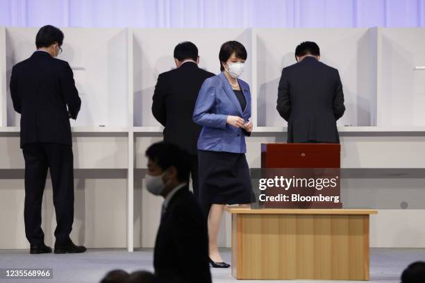 Sanae Takaichi, former minister of internal affairs and communications of Japan, casts her ballot in the run-off at the Liberal Democratic Party's...