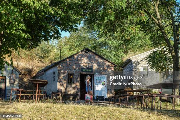 Wine cellars at the hill on the outskirts of the village are seen in Bogacs, Hungary on 25 September 2021 Bogacs wine cellars is a place where people...