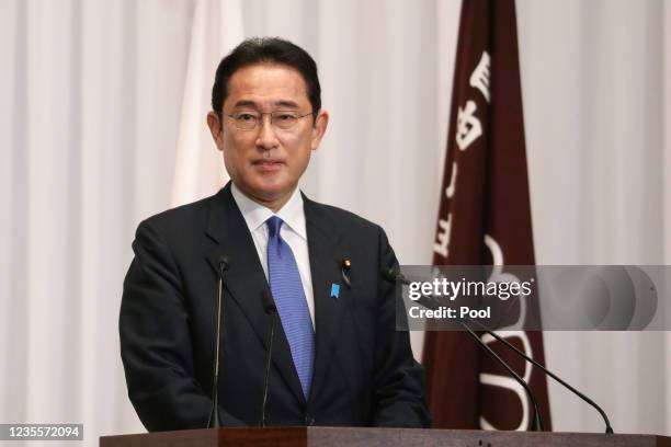 Japans former Foreign Minister Fumio Kishida speaks to the media after winning the ruling Liberal Democratic Party's presidential election on...