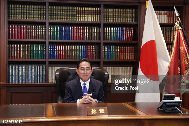 Japans former Foreign Minister Fumio Kishida poses for a photograph following a press conference after winning the ruling Liberal Democratic Party's...