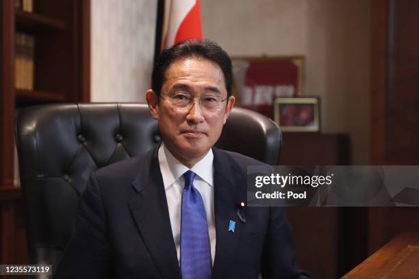 Japans former Foreign Minister Fumio Kishida poses for a photograph following a press conference after winning the ruling Liberal Democratic Party's...