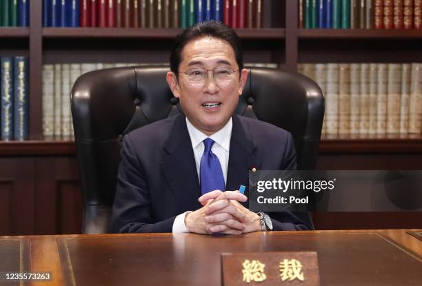 Japans former Foreign Minister Fumio Kishida poses for a photograph following a press conference after winning the ruling Liberal Democratic Party's...