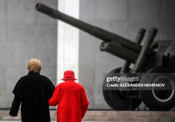 Two elderly women walk towards the Museum of the Great Patriotic War - the largest museum of military history in Russia with the biggest collection...