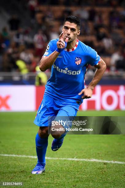 Luis Suarez of Club Atletico de Madrid celebrates after scoring a goal from a penalty kick during the UEFA Champions League football match between AC...