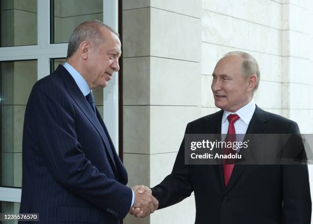 Russian President Vladimir Putin sees off Turkish President Recep Tayyip Erdogan after their meeting at the Russian Official Residence of Presidency...