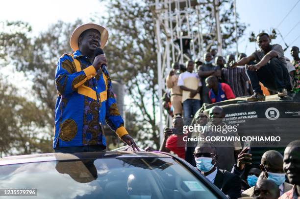 Kenya's former Prime Minister and opposition leader Raila Odinga delivers after he attended the inauguration of Kibra Level 3 hospital in Kibera slum...