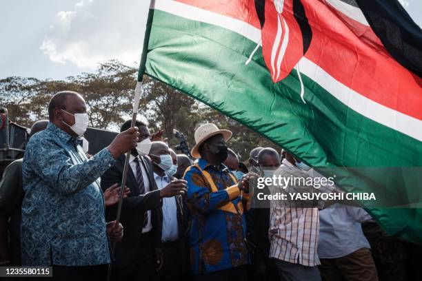 Kenya's President Uhuru Kenyatta and Kenya's opposition leader Raila Odinga attend an inauguration of Kibra Level 3 hospital in Kibera slum in...