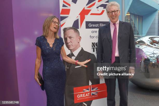 September 2021, Berlin: Jill Gallard, British Ambassador to Germany, and journalist Theo Koll stand by a stand-up of the film at a reception to mark...