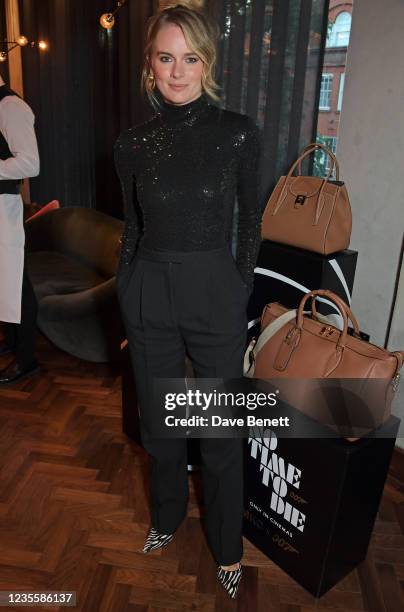 Cressida Bonas attends a private screening of 'No Time To Die' hosted by Michael Kors in celebration of the Michael Kors Bond 007 Capsule Collection...