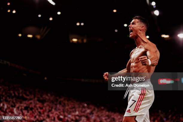 Cristiano Ronaldo of Manchester United celebrates scoring a goal to make the 2-1 during the UEFA Champions League group F match between Manchester...