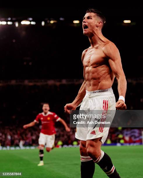 Cristiano Ronaldo of Manchester United celebrates scoring a goal to make the 2-1 during the UEFA Champions League group F match between Manchester...