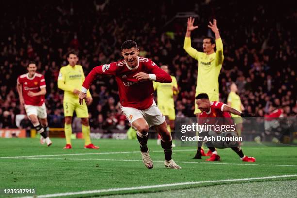 Cristiano Ronaldo of Manchester United celebrates scoring a goal to make the 2-1 during the UEFA Champions League group F match between Manchester...