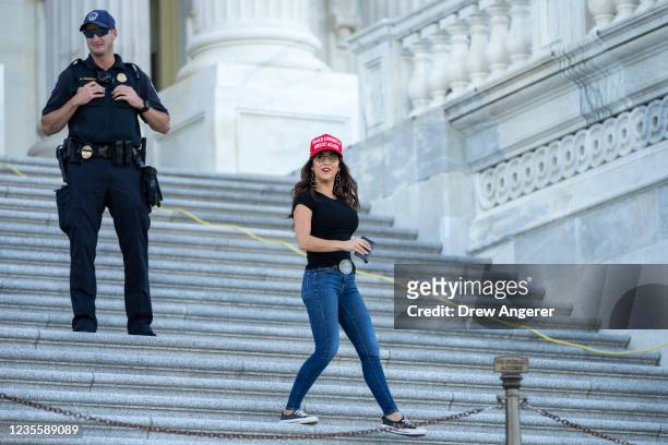 Rep. Lauren Boebert wears a 'Make America Great Again' hat as she leaves the U.S. Capitol on September 29, 2021 in Washington, DC. With a federal...