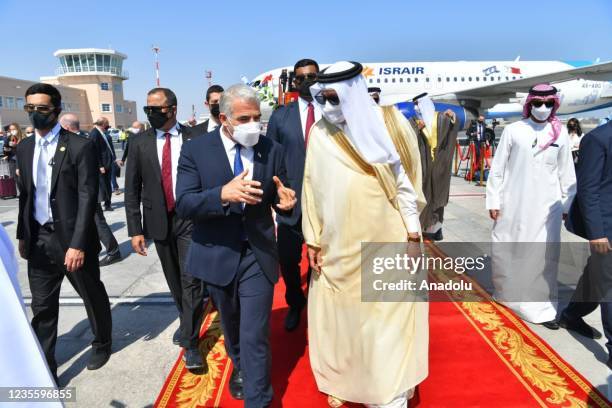 Israeli Foreign Minister Yair Lapid being welcomed by Bahraini Foreign Minister Abdullatif bin Rashid Al Zayani at Manama airport during his first...