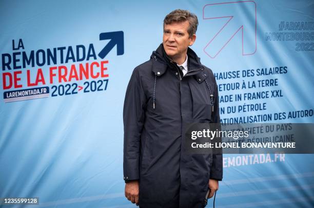 French former PS Economy Minister and candidate for the presidential election Arnaud Montebourg looks on as he visits a market in Carbonne,...